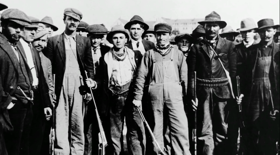 Armed miners participating in the 1914 Ludlow strike Photo Survey Associates Inc. II